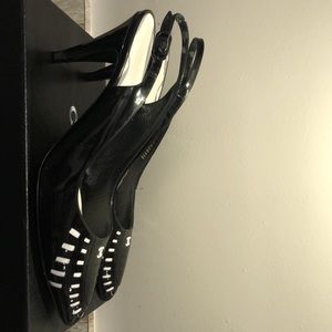 Chanel Patent Leather Slingback Pumps
Black